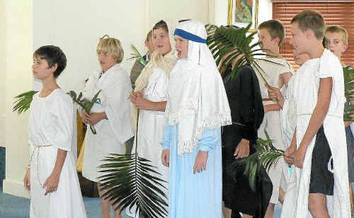 Students tell the Easter story. Students tell the Easter story.